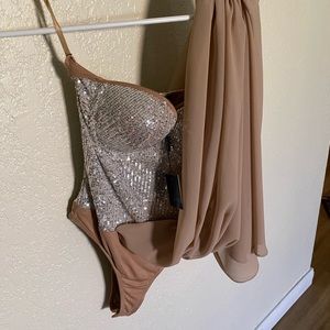 Selling a sequin body suit JLux